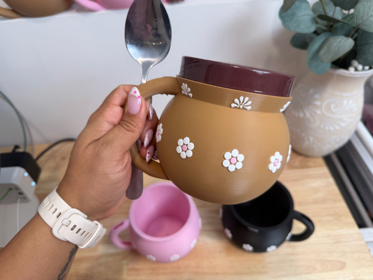 Brown Jarrito holder with an ice cream pint and spoon